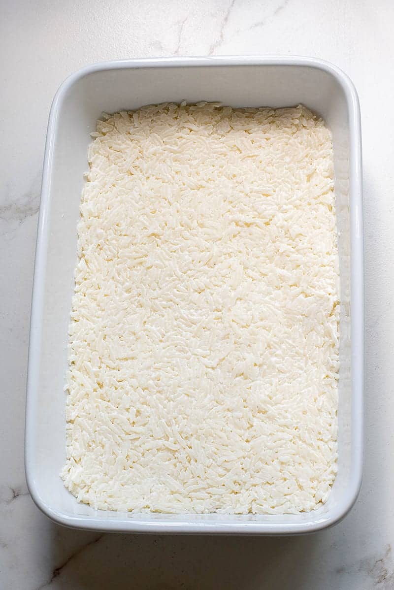 mixed rice layer in a casserole dish